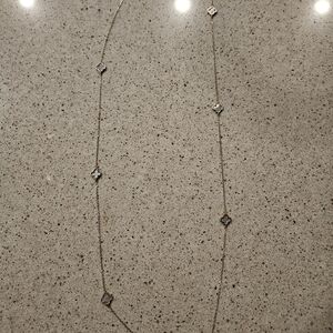 Elegant Gold and White Clover Necklace